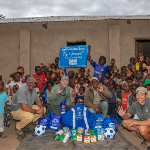 Group photo for Bell Family Blue Bag Program