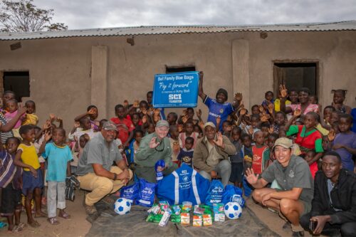 Group photo for Bell Family Blue Bag Program